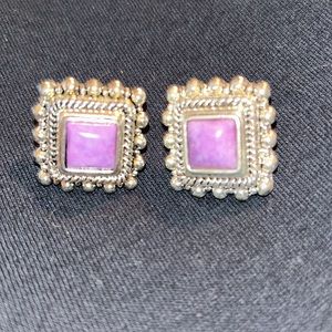 Silver pierced earrings with a lovely shade of purple stones